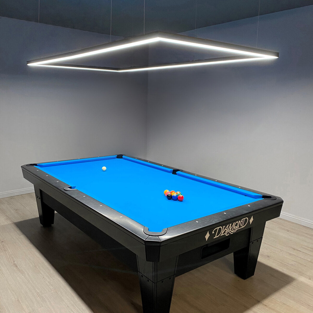 LED pool table light over a diamond pool table 